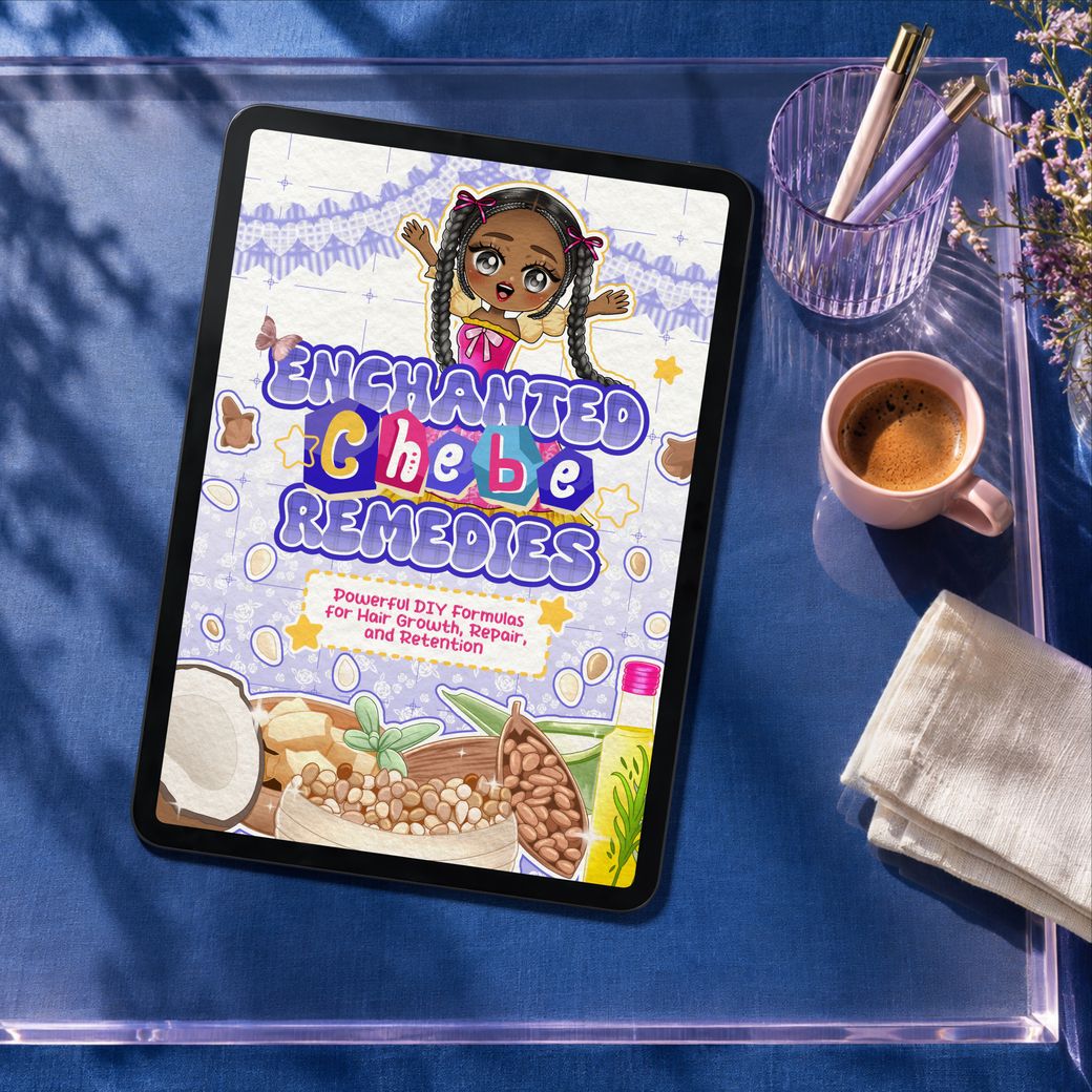 The full Enchanted Chebe Remedies cover on an iPad in a blue acrylic studio with coffee and stationery