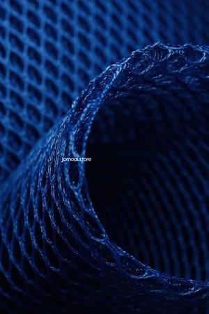 Blue industrial mesh fabric roll close-up