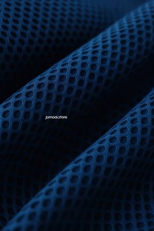 Blue breathable mesh fabric with soft geometric folds