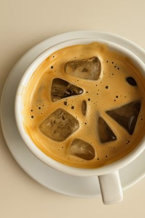 Minimalist Iced Americano In White Ceramic Cup