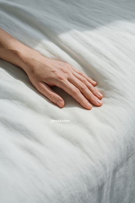 Delicate Female Hand on White Linen – Soft Minimalist Light Aesthetic