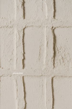 Textured Plaster Wall with Grid Pattern in Warm Beige Tone