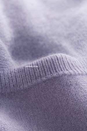 Macro Texture of Lilac Knitwear – Ribbed and Smooth Wool Detail