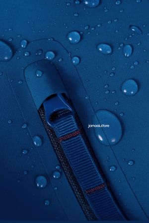 Close-up of waterproof zipper with water droplets