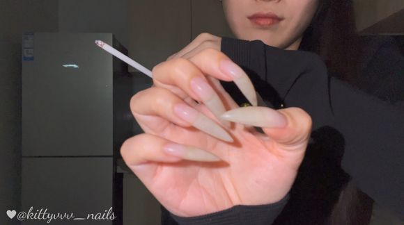 Sexy Smoking with my long natural claws (and some cleavage)