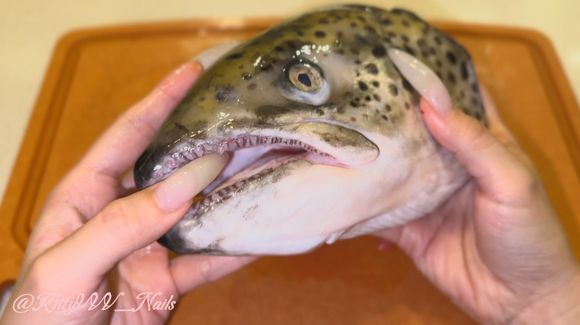 Playing and Destroying a Salmon Head with my Sharp Nails