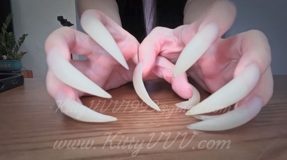 Longest nails ever on my desk, stroking and tapping