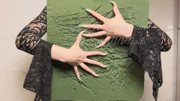 Scratching and tearing apart your back whilst asking whether you enjoy it 