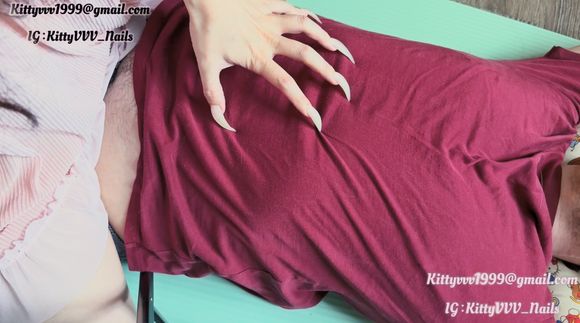 Ripping my slaves t-shirt off with my claws