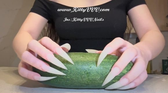 Tearing apart (quite a big) cucumber with my claws