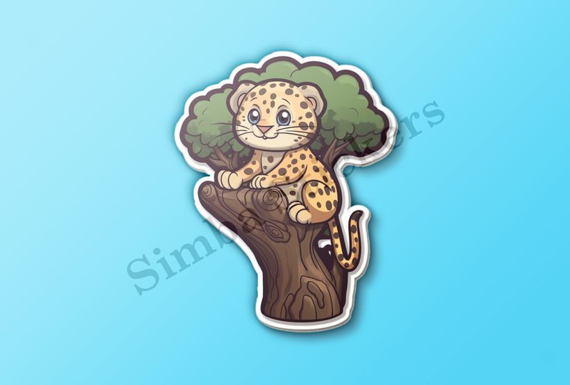 Leopard cub in a tree