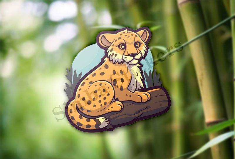 Baby cheetah on a log