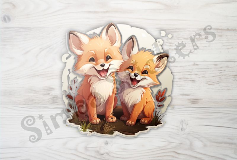 Two red fox kits laughing 