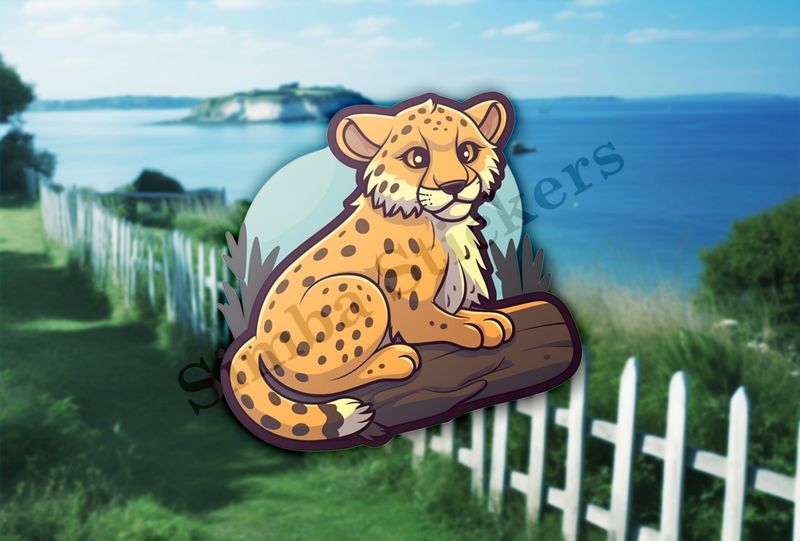 Baby cheetah on a log