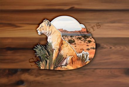 Lioness sitting in the Savanna