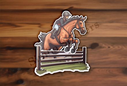 Brown horse with rider jumping over a fence