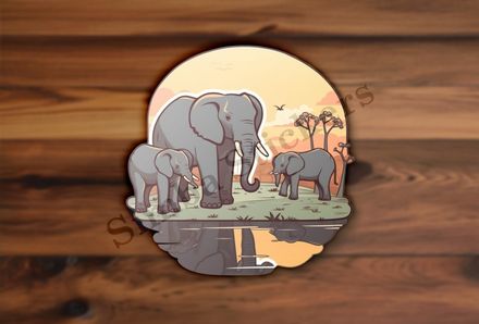 African elephant family at a pond in the Savanna