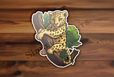 Leopard youngling resting in a tree