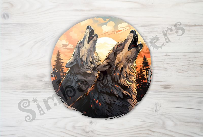 Wolves howling at the moon under dramatic sky