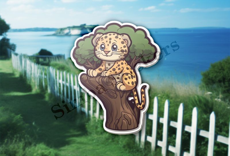 Leopard cub in a tree