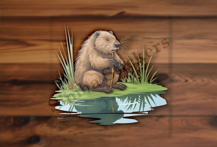Beaver by the riverbank holding a stick