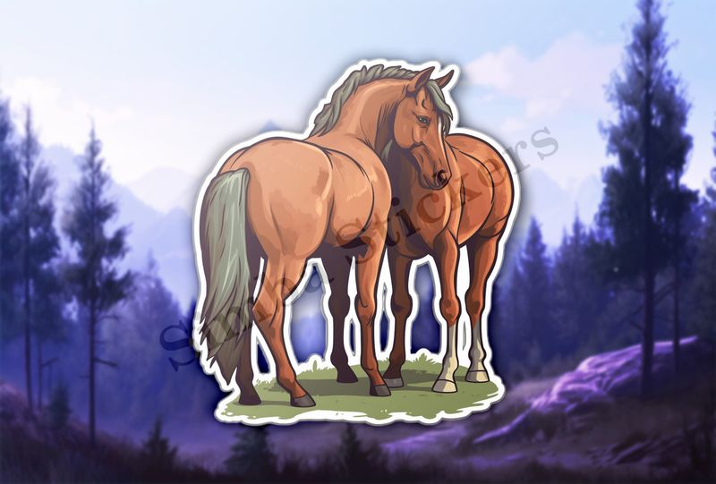 Two brown horses on green grass