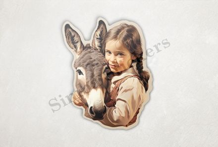 Donkey held by small girl of European origin iin cowgirlish clothes