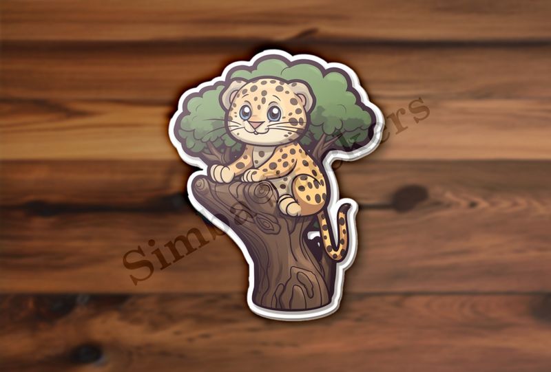 Leopard cub in a tree