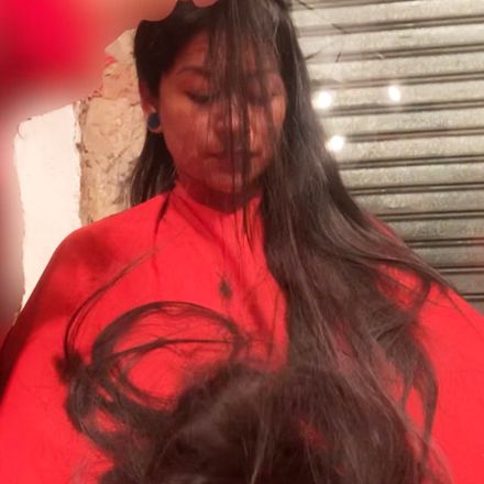 Waist-length hair gets the chop