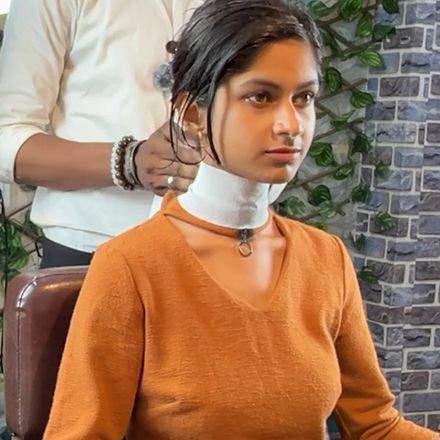 Fierce girl cuts long hair to crew cut