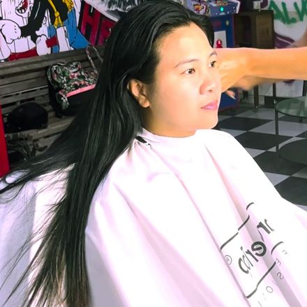Barberette cuts long hair to undercut bob