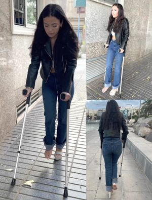Barefoot street crutching wearing high heel by Elian