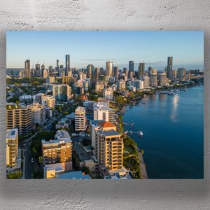 Brisbane City Skyline A Stunning Aerial View of the River and High-Rises Photo Download