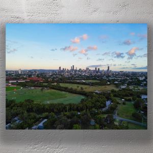Brisbane City Skyline at Dusk A Stunning Aerial View from Norman Park Photo Download