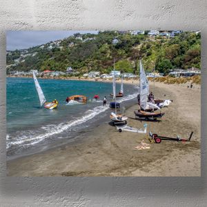 Dramatic Dinghy Sailing at Worser Bay New Zealand Capsized Boat and Beach Action Photo Download