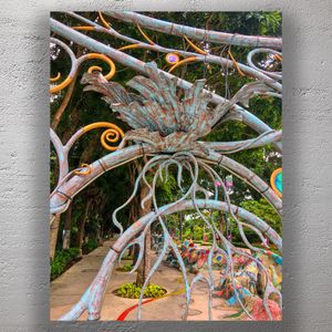 Whimsical Metal and Mosaic Garden Art Vibrant Outdoor Sculpture in Lush Greenery Photo Download