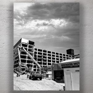 Urban Deconstruction Demolition of an Abandoned Building Under Dramatic Skies Photo Download