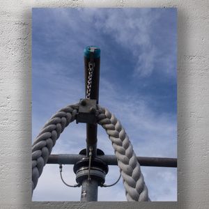 Heavy Duty Braided Rope and Metal Pulley System Against Blue Sky Photo Download