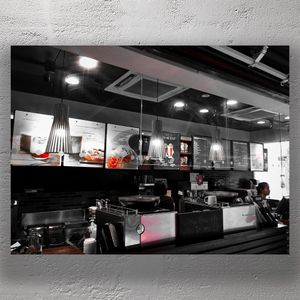 Modern Coffee Shop Interior Stylish Café Counter with Warm Lighting and Menu Display Photo Download