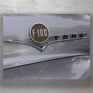 Vintage Ford F-100 Emblem Classic Truck Badge on Silver Paint Photo Download