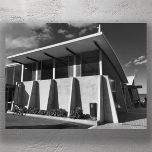 Modern Coastal Building with Angular Concrete Architecture and Ocean View Photo Download