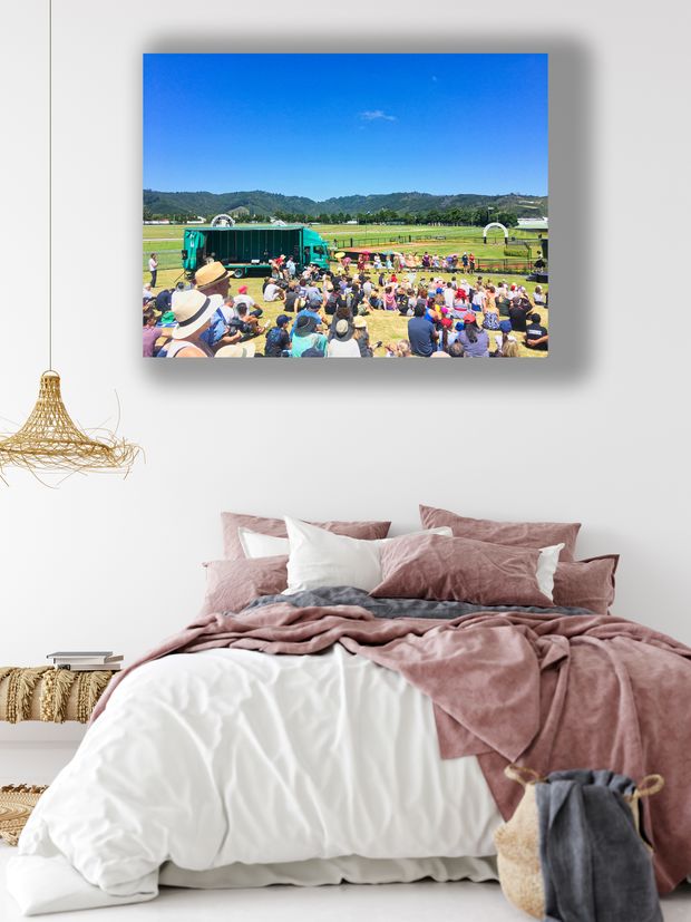 Vibrant Outdoor Event at Trentham Racecourse Crowds Stage and Scenic Backdrop Photo Download