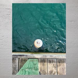 Rustic Wooden Jetty with Weathered Mooring Post in Tranquil Turquoise Waters Photo Download