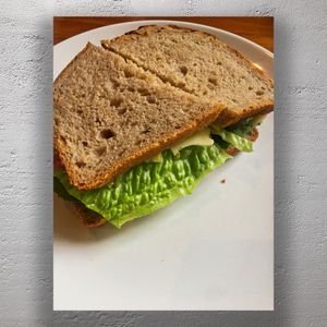 Delicious Homemade Sandwich on Rustic Whole Wheat Bread Photo Download