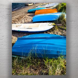 Colorful Rowboats on Sandy Shoreline by the Water Photo Download