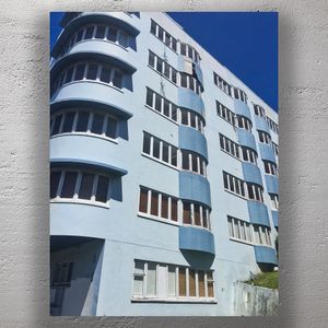 Abandoned Art Deco Blue Apartment Building with Curved Windows Urban Architecture Photo Download