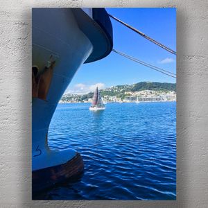 Sailboat on Wellington Harbour Framed by Docked Ship – Scenic New Zealand Waterfront Photo Download
