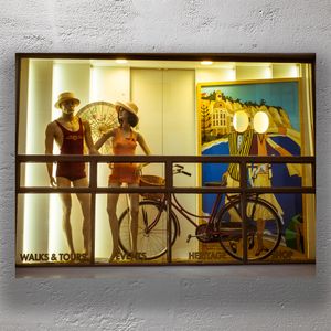 Vintage Beachwear Window Display with Retro Bicycle Nostalgic Storefront Aesthetic Photo Download