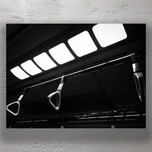 Minimalist Black and White Train Passenger Handles Urban Transit Photography Photo Download