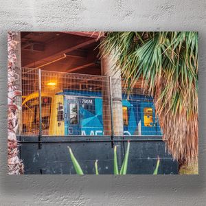 Vibrant Melbourne Train Behind Fence Urban Rail Photography Photo Download